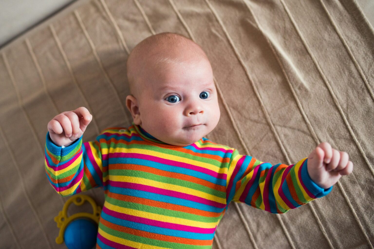 Children’s Seizure Precautions: A Safety Guide for Parents Newborn child lay on sofa