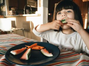 Watermelon eating kid